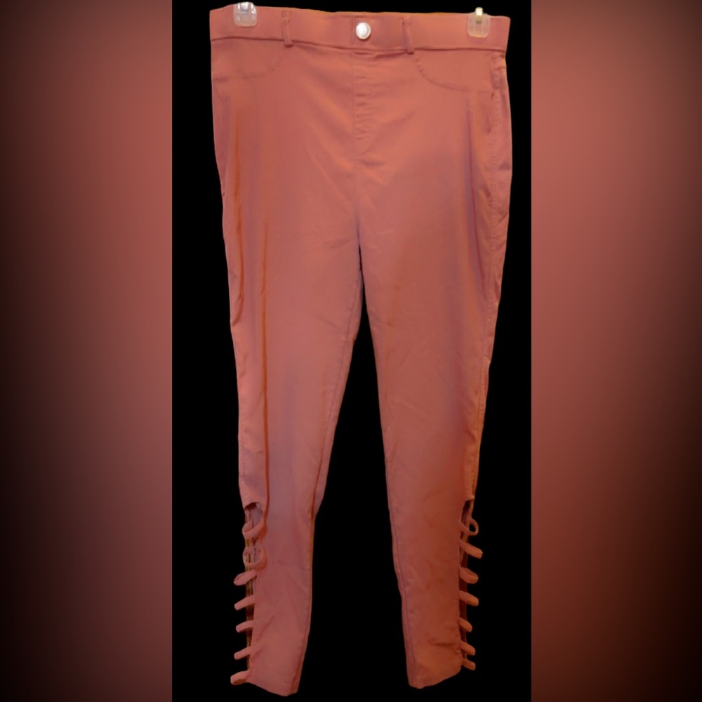 Pinkish button slack pants design straps on each side at bottom of pants  👖